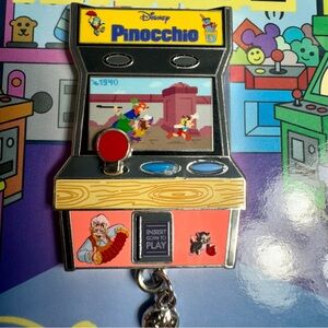 NWT. NWT. Disney pin trading pin. Pinnochio Disney Arcade series pin LE. Dangle